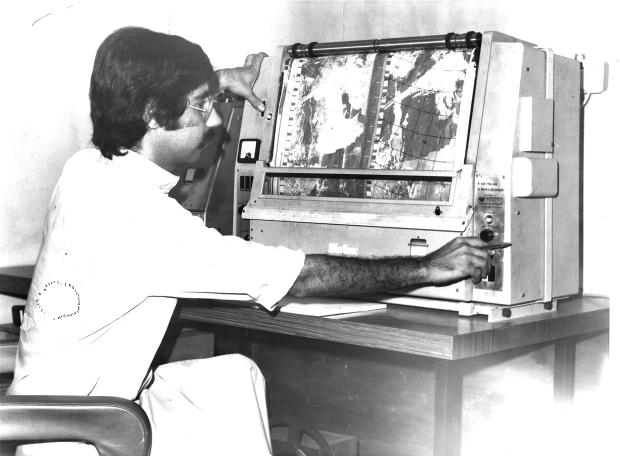 MAY 1979: Weather man Majlis Essa operates the elaborate machine that will forecast the weather for the Bahrain area.
